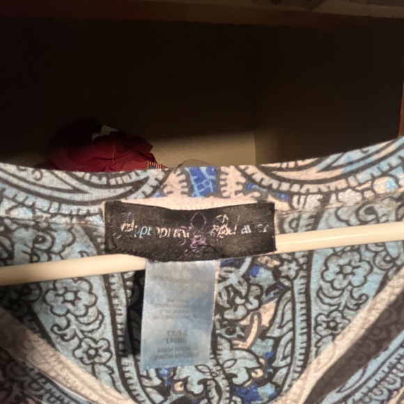 Blue, black, and white V neck shirt with short sleeves - Picture 3 of 3